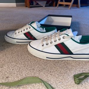 Gucci Sneakers Womens size 8 but will fit 7 1/2. Worn twice. Still in box/title